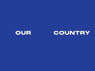 Royal-blue section-divider spread reading OUR COUNTRY