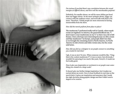 Spread with a black-and-white close-up of hands playing an acoustic guitar and the final interview page
