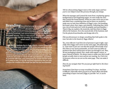 Spread with white text over a warm photo of a hand on an acoustic guitar, and an interview page